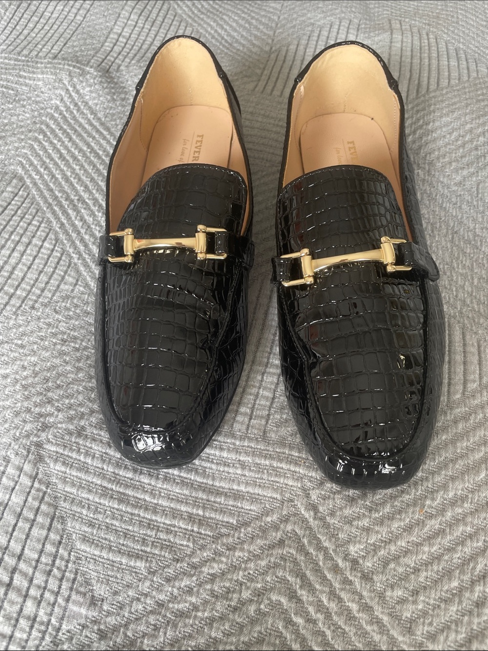 Black croc design loafers w/ gold front buckle. Rubber non-slip soles. Size 9.5